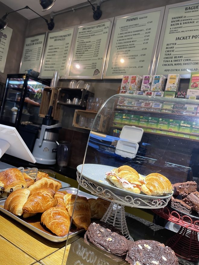 Pastries under glass at the service counter